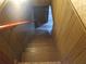 Staircase with wooden paneling and carpeted steps at 4141 Fredericksburg Dr, College Park, GA 30337