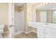 Well-lit bathroom with separate shower and vanity with storage at 1016 Borrington Ln, Stockbridge, GA 30281