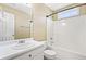 Clean, well-lit bathroom with vanity, mirror, and combined shower and bathtub at 1016 Borrington Ln, Stockbridge, GA 30281