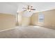 Spacious bedroom with neutral carpeting and ample natural light at 1016 Borrington Ln, Stockbridge, GA 30281