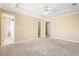 Large main bedroom featuring a walk-in closet and ensuite bathroom at 1016 Borrington Ln, Stockbridge, GA 30281
