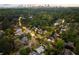 Beautiful neighborhood view with the city skyline in the distance surrounded by lush trees at 1016 Wildwood Ne Rd, Atlanta, GA 30306