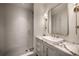 Modern bathroom with a glass-enclosed shower, marble countertop, and stylish fixtures at 1016 Wildwood Ne Rd, Atlanta, GA 30306