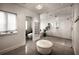 Modern bathroom featuring a large shower with glass enclosure, a separate toilet room, and neutral tones at 1016 Wildwood Ne Rd, Atlanta, GA 30306