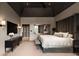 Spacious bedroom with a gray paneled ceiling, a large bed, TV, dresser, and an ensuite bathroom at 1016 Wildwood Ne Rd, Atlanta, GA 30306