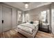 Bedroom with a comfortable bed, bedside tables, and an ensuite bathroom at 1016 Wildwood Ne Rd, Atlanta, GA 30306