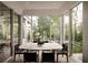 Bright dining room with panoramic views of the surrounding landscape at 1016 Wildwood Ne Rd, Atlanta, GA 30306