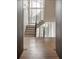 Elegant foyer with hardwood floors, staircase, and large windows creating a bright and welcoming space at 1016 Wildwood Ne Rd, Atlanta, GA 30306