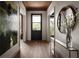 Inviting hallway with wood floors, sophisticated decor, and ample natural light, creating a seamless flow at 1016 Wildwood Ne Rd, Atlanta, GA 30306