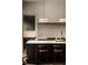 Sleek kitchen island features counter seating and designer pendant lighting at 1016 Wildwood Ne Rd, Atlanta, GA 30306