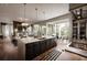 Open-concept living with a kitchen with a large island, modern appliances, and seamless living room access at 1016 Wildwood Ne Rd, Atlanta, GA 30306