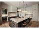 Bright kitchen with a large island, stainless steel appliances, and white cabinetry at 1016 Wildwood Ne Rd, Atlanta, GA 30306
