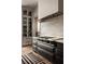 Gourmet kitchen boasts a professional range, custom cabinets, and stylish finishes at 1016 Wildwood Ne Rd, Atlanta, GA 30306