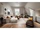 Bright and open living room with hardwood floors, vaulted ceilings, and stylish modern furniture at 1016 Wildwood Ne Rd, Atlanta, GA 30306