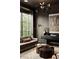Stylish living room featuring herringbone floors, dark walls and trim, and designer furniture, perfect for relaxation at 1016 Wildwood Ne Rd, Atlanta, GA 30306