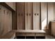 Mudroom with custom wood panels, built-in bench and storage, plus coat hooks at 1016 Wildwood Ne Rd, Atlanta, GA 30306