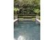 Stunning pool with elegant landscaping creating a private outdoor oasis at 1016 Wildwood Ne Rd, Atlanta, GA 30306