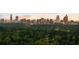 Stunning view of the city skyline from a neighborhood full of mature trees and beautiful landscape at 1016 Wildwood Ne Rd, Atlanta, GA 30306