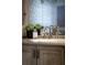 Close up of a bathroom vanity and glass textured shower door at 3711 Spinnaker Cir, Alpharetta, GA 30005