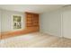 This bedroom features a window seat, built-in shelving, and neutral paint at 3711 Spinnaker Cir, Alpharetta, GA 30005