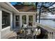 Inviting outdoor deck with cozy seating and stunning waterfront views, perfect for relaxing and entertaining at 3711 Spinnaker Cir, Alpharetta, GA 30005