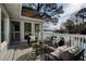 Enjoy lake views from this beautifully furnished outdoor deck at 3711 Spinnaker Cir, Alpharetta, GA 30005