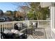Relax on this charming deck overlooking the backyard and trees at 3711 Spinnaker Cir, Alpharetta, GA 30005