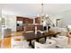 Open layout dining area and kitchen featuring stainless steel appliances at 3711 Spinnaker Cir, Alpharetta, GA 30005