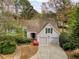 Charming home with a well-manicured lawn and a two-car garage at 3711 Spinnaker Cir, Alpharetta, GA 30005