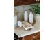 Close up of the counter with oil and vinegar dispensers and kitchen decor at 3711 Spinnaker Cir, Alpharetta, GA 30005