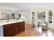 Bright eat-in kitchen features a countertop bar area and a breakfast nook with lake views at 3711 Spinnaker Cir, Alpharetta, GA 30005