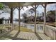Spacious porch overlooking a serene lake with stunning views at 3711 Spinnaker Cir, Alpharetta, GA 30005