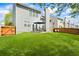 Spacious backyard with a patio, perfect for outdoor entertaining and relaxation at 512 Watercress Dr, Woodstock, GA 30188