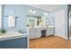 Open bathroom with large vanity, double sinks, modern fixtures, and a large soaking tub at 512 Watercress Dr, Woodstock, GA 30188