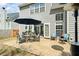 Cozy patio with outdoor seating, ideal for enjoying the backyard view at 512 Watercress Dr, Woodstock, GA 30188