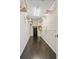 Spacious walk-in closet with wood floor and metal racks for optimal organization at 512 Watercress Dr, Woodstock, GA 30188