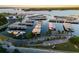 An aerial view of the marina at Lanier Islands reveals covered boat slips and ample parking at 6477 Old Shadburn Ferry Rd, Buford, GA 30518