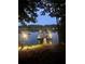 Dock featuring boat lifts on calm waters surrounded by lush greenery and trees at 6477 Old Shadburn Ferry Rd, Buford, GA 30518
