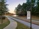 Road to Landshark Bar & Grill at Lanier Islands with manicured path, promoting a warm welcome at 6477 Old Shadburn Ferry Rd, Buford, GA 30518