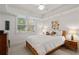 This sunny bedroom offers plenty of natural light at 1010 Lake Shore Overlook, Alpharetta, GA 30005