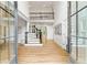 Spacious two-story foyer with hardwood floors, grand staircase, and elegant iron railings at 1010 Lake Shore Overlook, Alpharetta, GA 30005