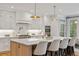 Well-equipped kitchen with a large island, stainless steel appliances, and ample counter space at 1010 Lake Shore Overlook, Alpharetta, GA 30005