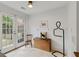 This mud room enjoys natural light and access to the exterior at 1010 Lake Shore Overlook, Alpharetta, GA 30005