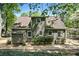 Back exterior view of home with well manicured lawn, shrubbery and a gazebo at 1745 Shady Hill Ne Rd, Marietta, GA 30068