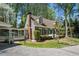 Quaint home with a brick chimney and covered walkway for outdoor enjoyment at 1745 Shady Hill Ne Rd, Marietta, GA 30068