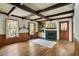 Bright living room with wood accents, a fireplace, and built-in shelving at 1745 Shady Hill Ne Rd, Marietta, GA 30068