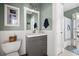 Charming bathroom featuring a vanity with storage, tiled floors, and shower with curtain at 2964 Anderson Se Cir, Smyrna, GA 30080