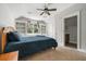 This bedroom has carpeted floors, built-in shelving and direct access to a bathroom at 2964 Anderson Se Cir, Smyrna, GA 30080