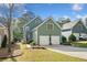 Detached two-car garage with an attached driveway and well-maintained lawn at 2964 Anderson Se Cir, Smyrna, GA 30080