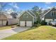 Detached two-car garage with an attached driveway and well-maintained lawn at 2964 Anderson Se Cir, Smyrna, GA 30080